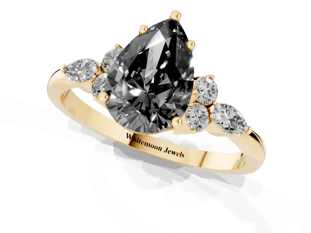 Fancy Black Pear Cut Brilliant Diamond Solitaire Ring with Pear Side Stones and Four-Prong Setting Yellow gold