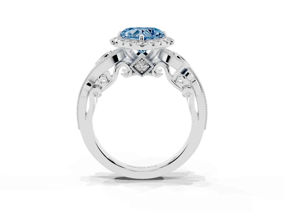 Fancy Blue Heart Cut Halo Diamond Ring with Milgrain and Bezel Accents on a Split Shank Band Platinum
