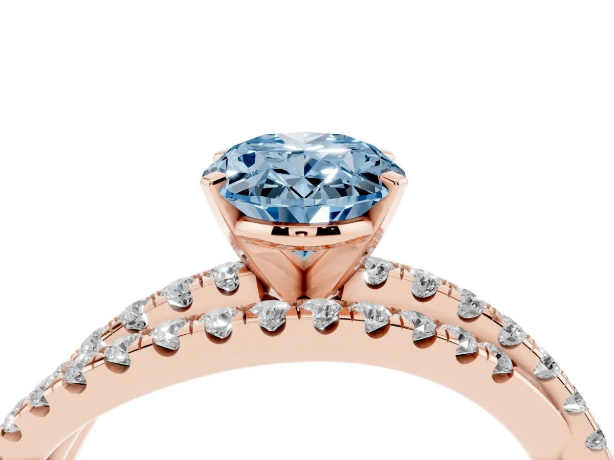 Fancy Blue Oval Cut Solitaire Twist Band with Pavé Setting and Four-Prong Setting Rose gold
