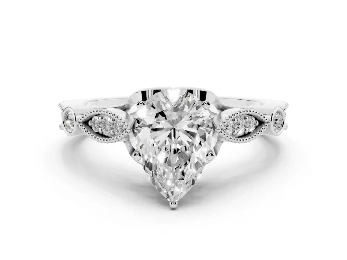 Pear Cut Cut Diamond with Milgrain Marquise and Bezel Accents on a Solitaire Band with Prong Setting Platinum