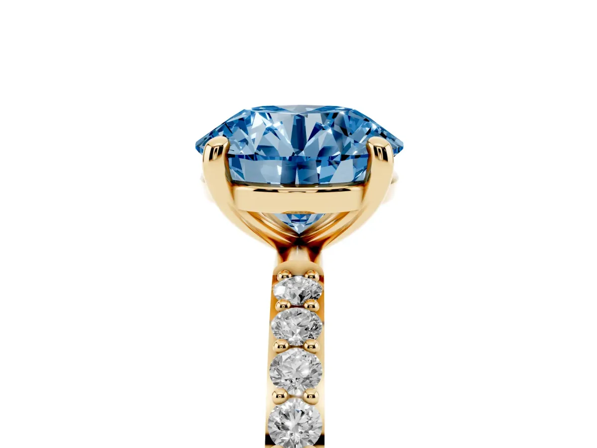 Fancy Blue Round Cut Diamond Solitaire Ring with Round Pavé Band and Prong Setting Yellow gold
