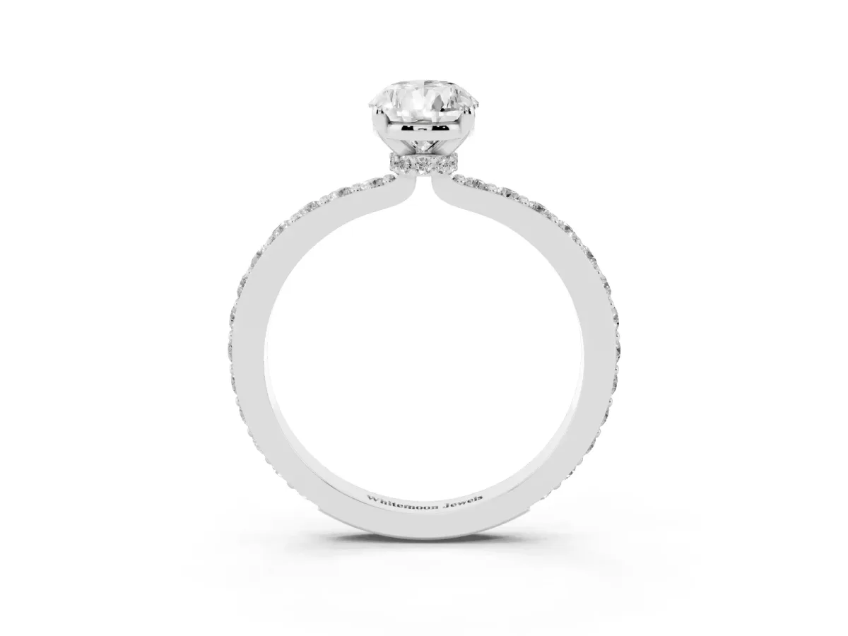 Pear Cut Diamond Pavé Engagement Ring with Round Accents and Prong Setting Platinum
