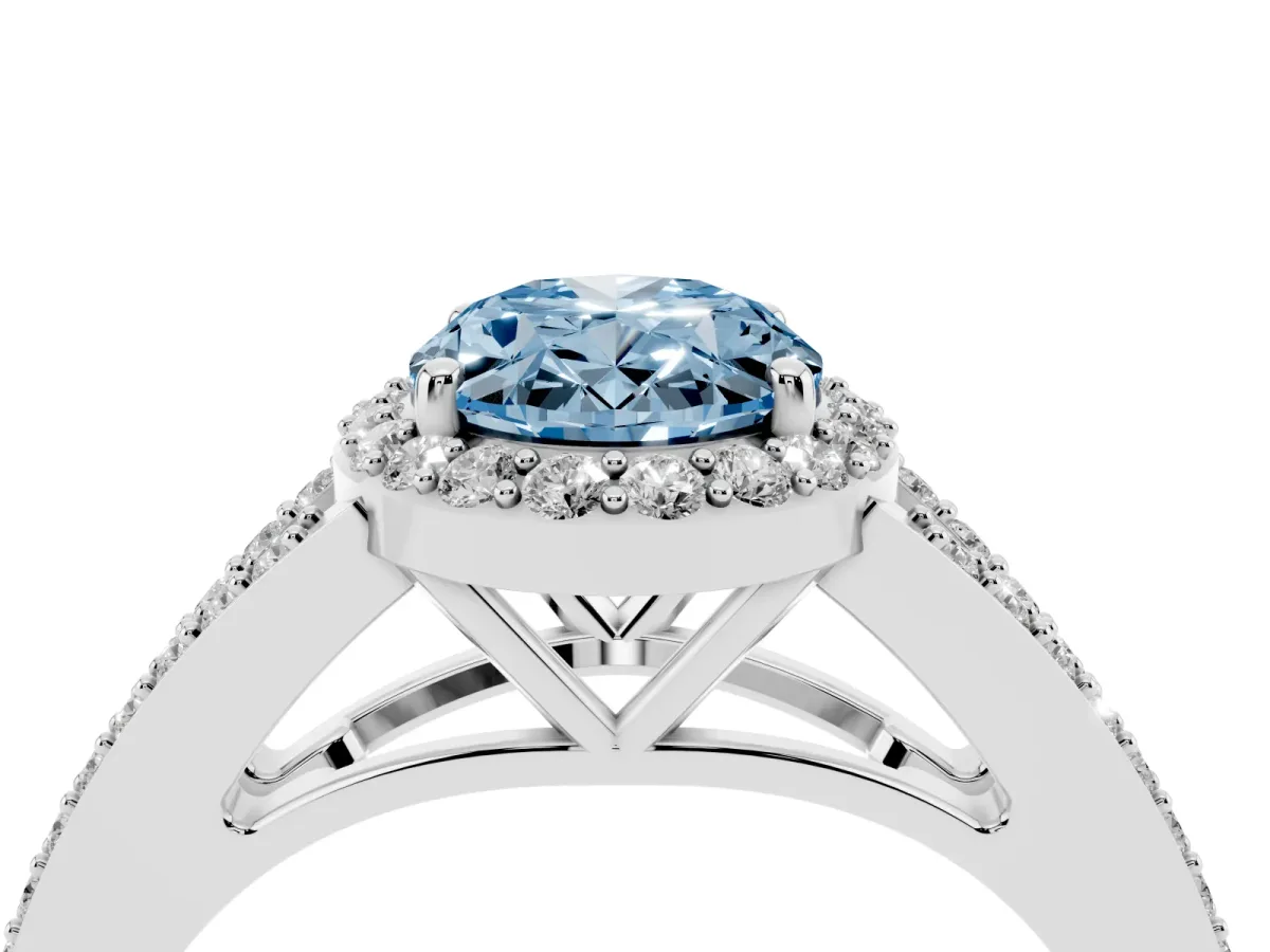 Fancy Blue Oval Cut Halo Split Shank Pave Diamond Ring with Four-Prong Setting Silver