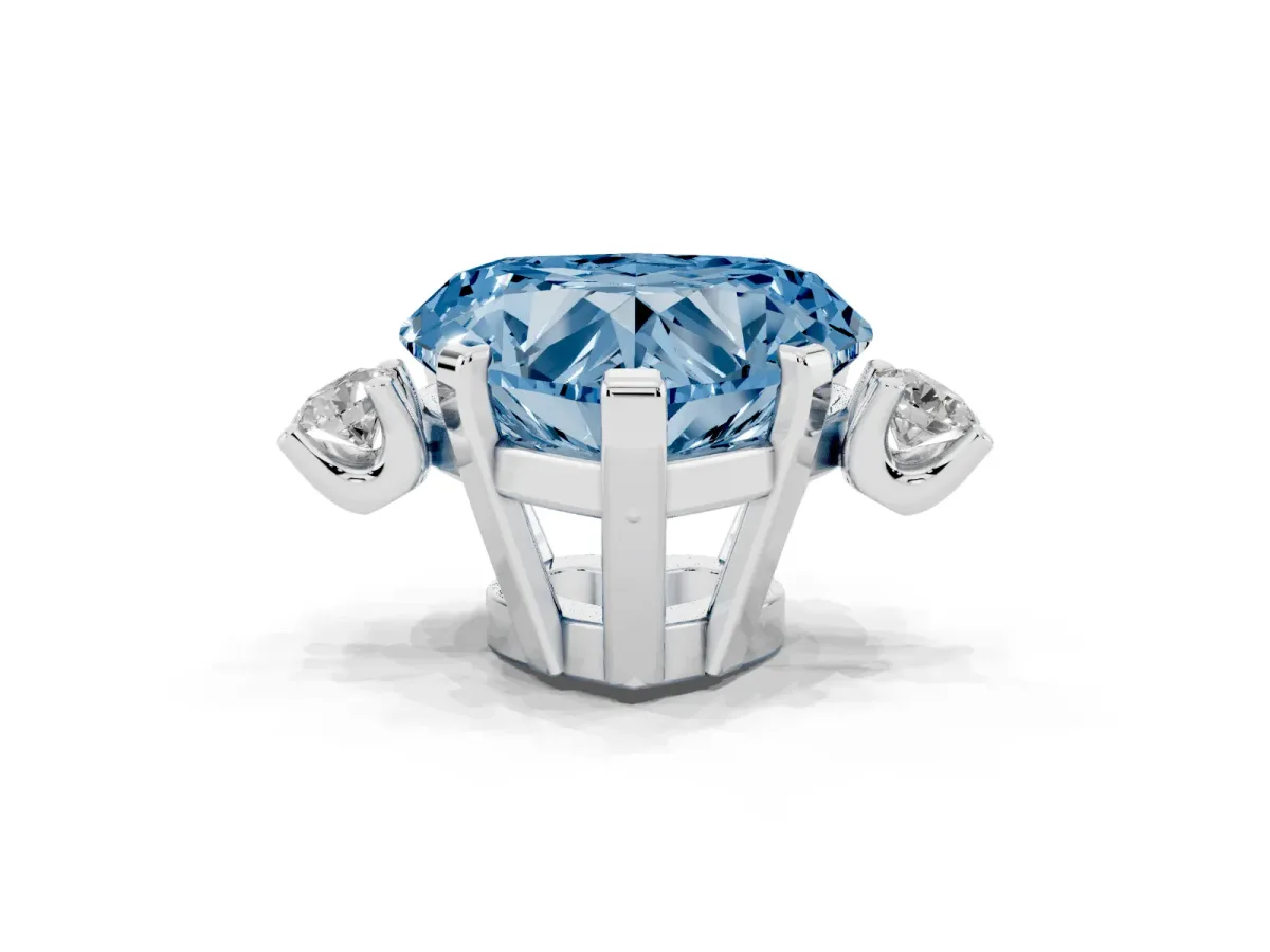 Fancy Blue Heart Cut Cut Three-Stone Solitaire Ring with Round Accent Diamonds and Four-Prong Setting Silver