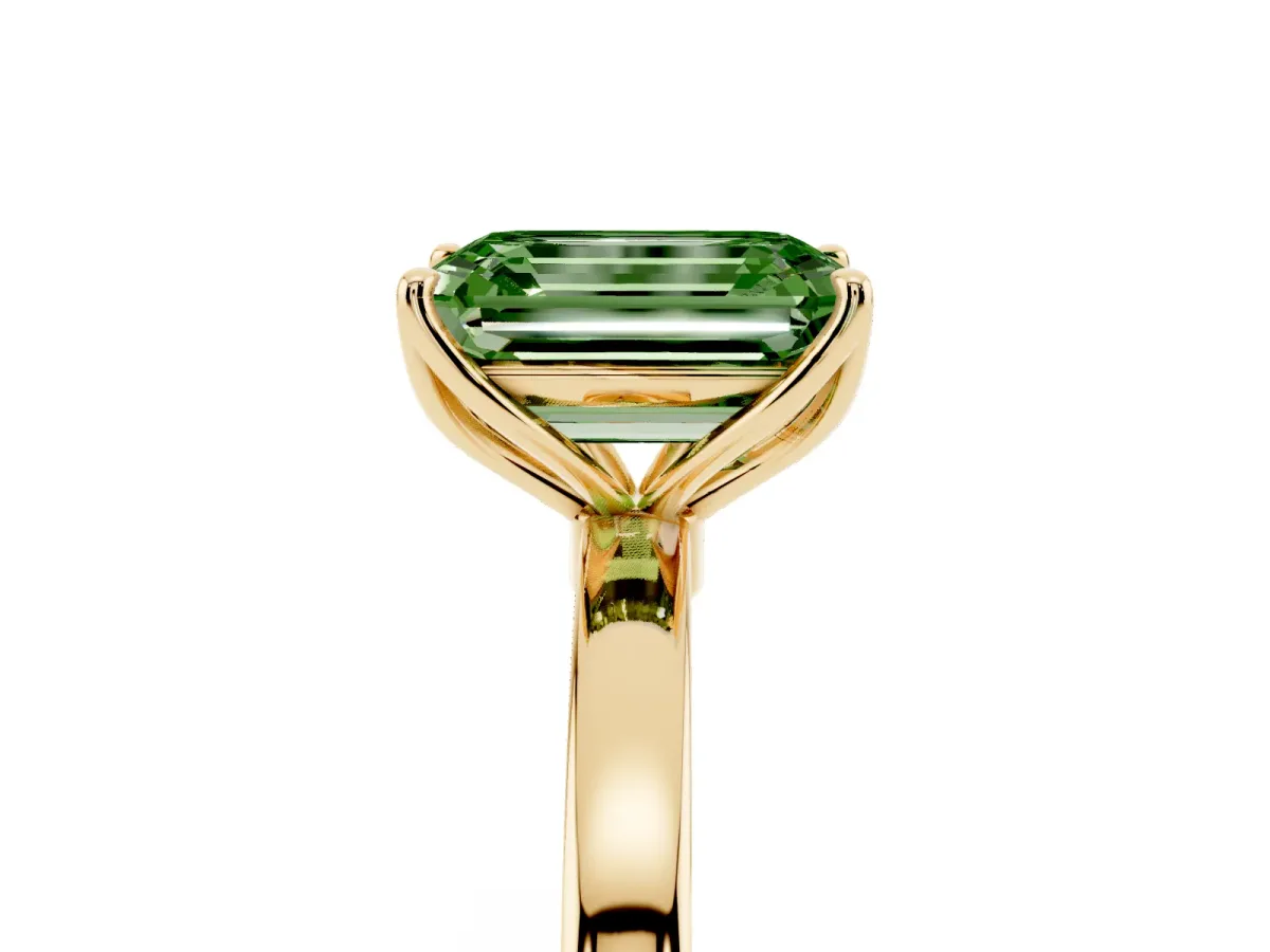 Fancy Green Emerald Cut Diamond Solitaire Ring with Thin Band and Prong Setting Yellow gold