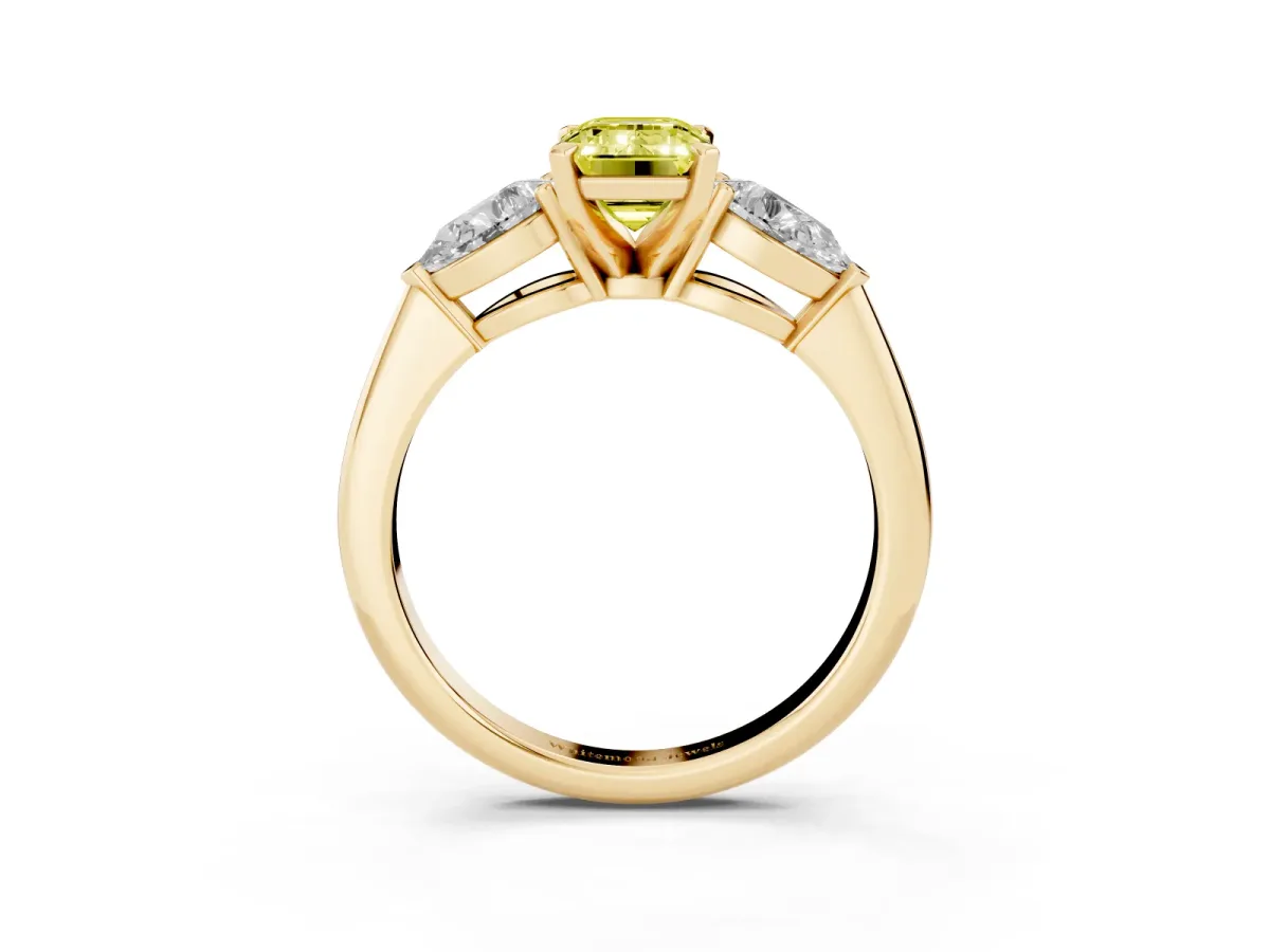 Fancy Yellow Three-Stone Emerald Cut Diamond Ring with Pear Side Stones and Four-Prong Setting Yellow gold