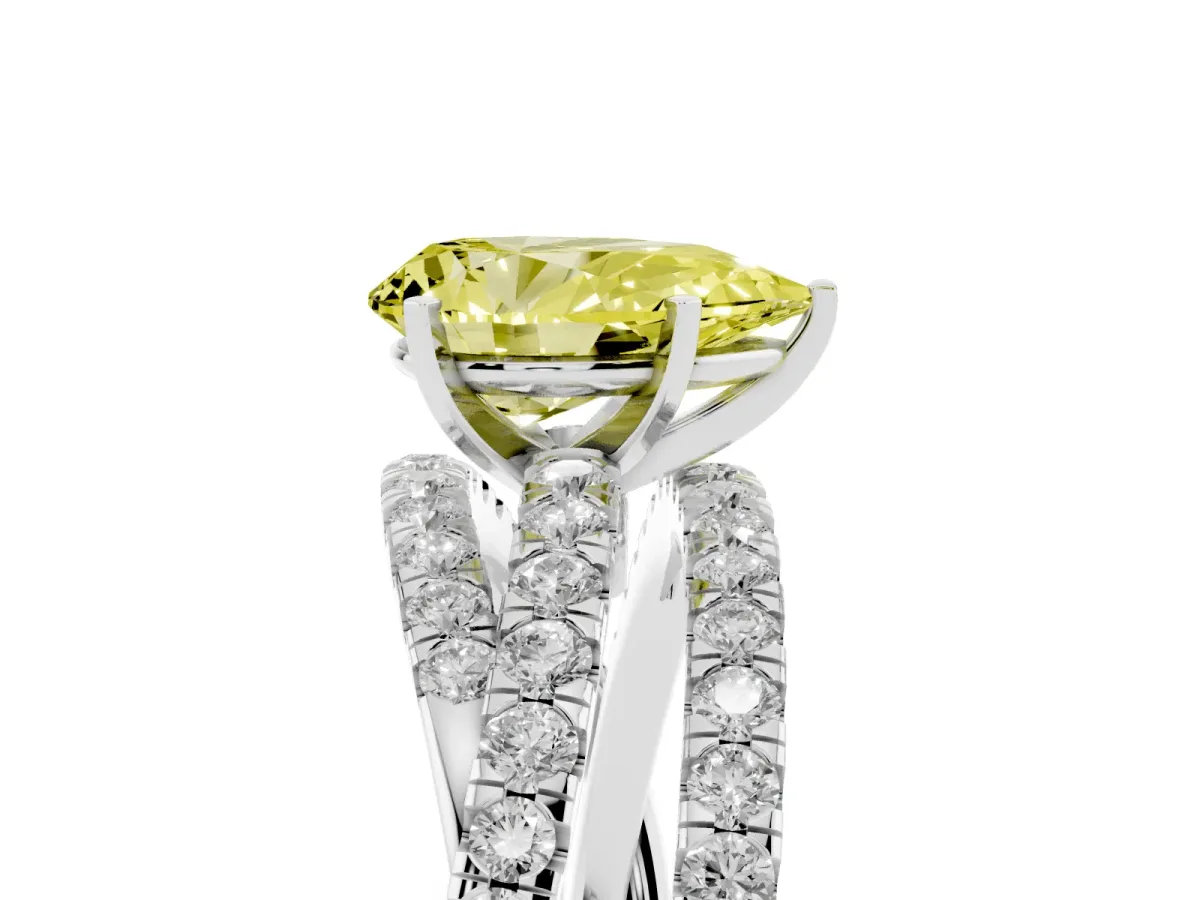 Fancy Yellow Pear Cut Solitaire Twist Band with Pavé Setting and Four-Prong Setting Silver
