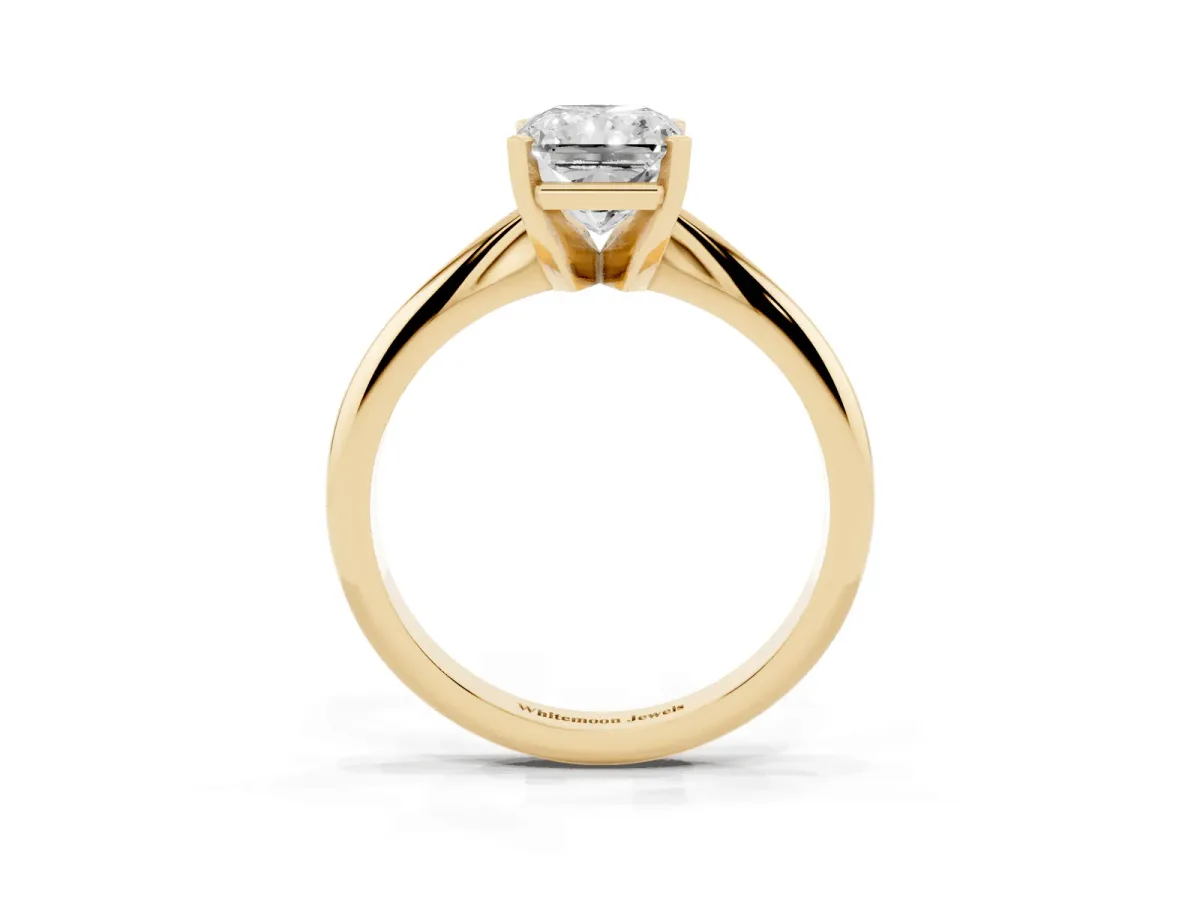 Radiant Cut Cut Solitaire Ring with Four-Prong Setting on a Classic Band Yellow gold