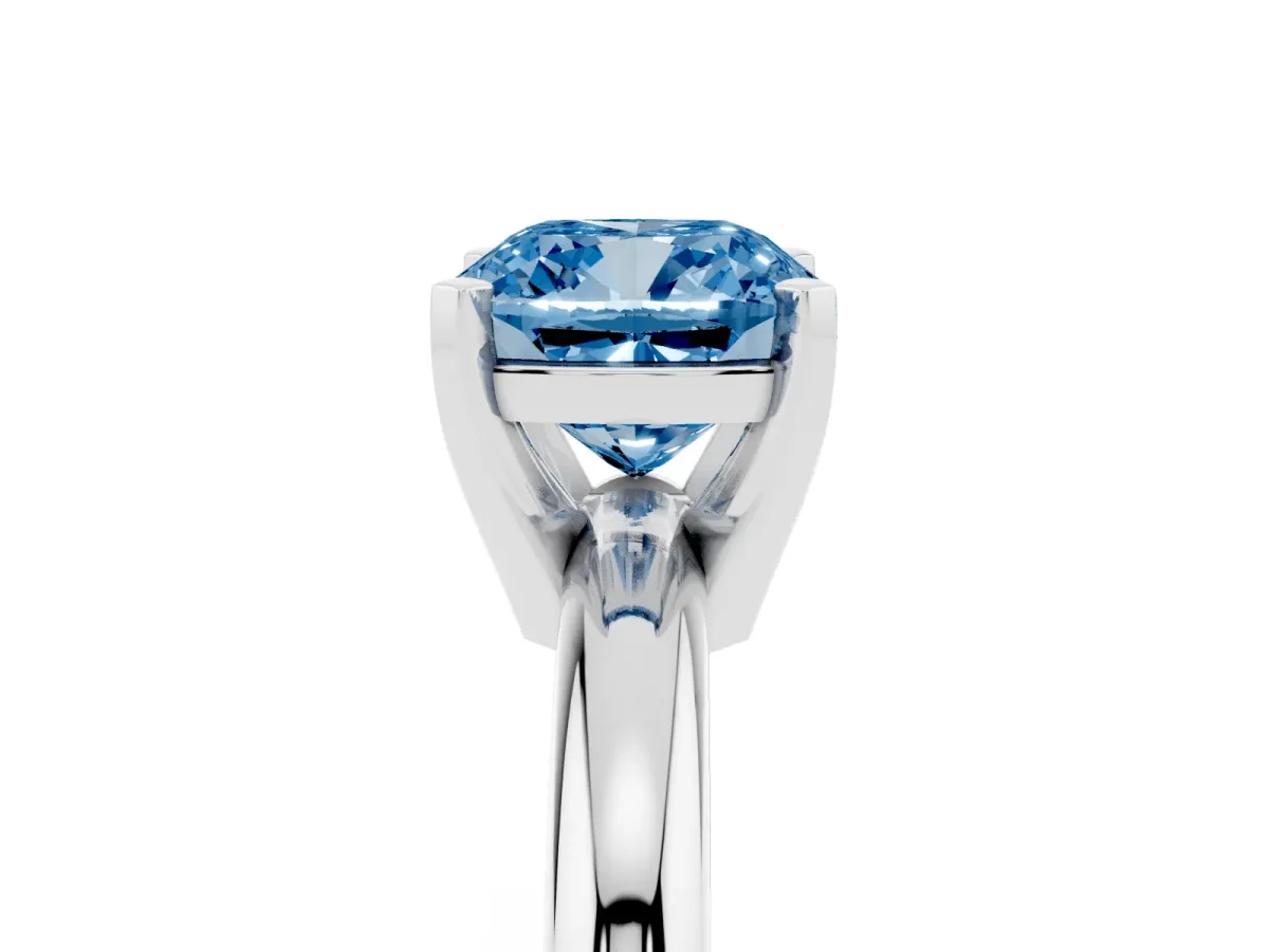 Fancy Blue Cushion Cut Diamond Solitaire Engagement Ring with Round Band and Four-Prong Setting Platinum