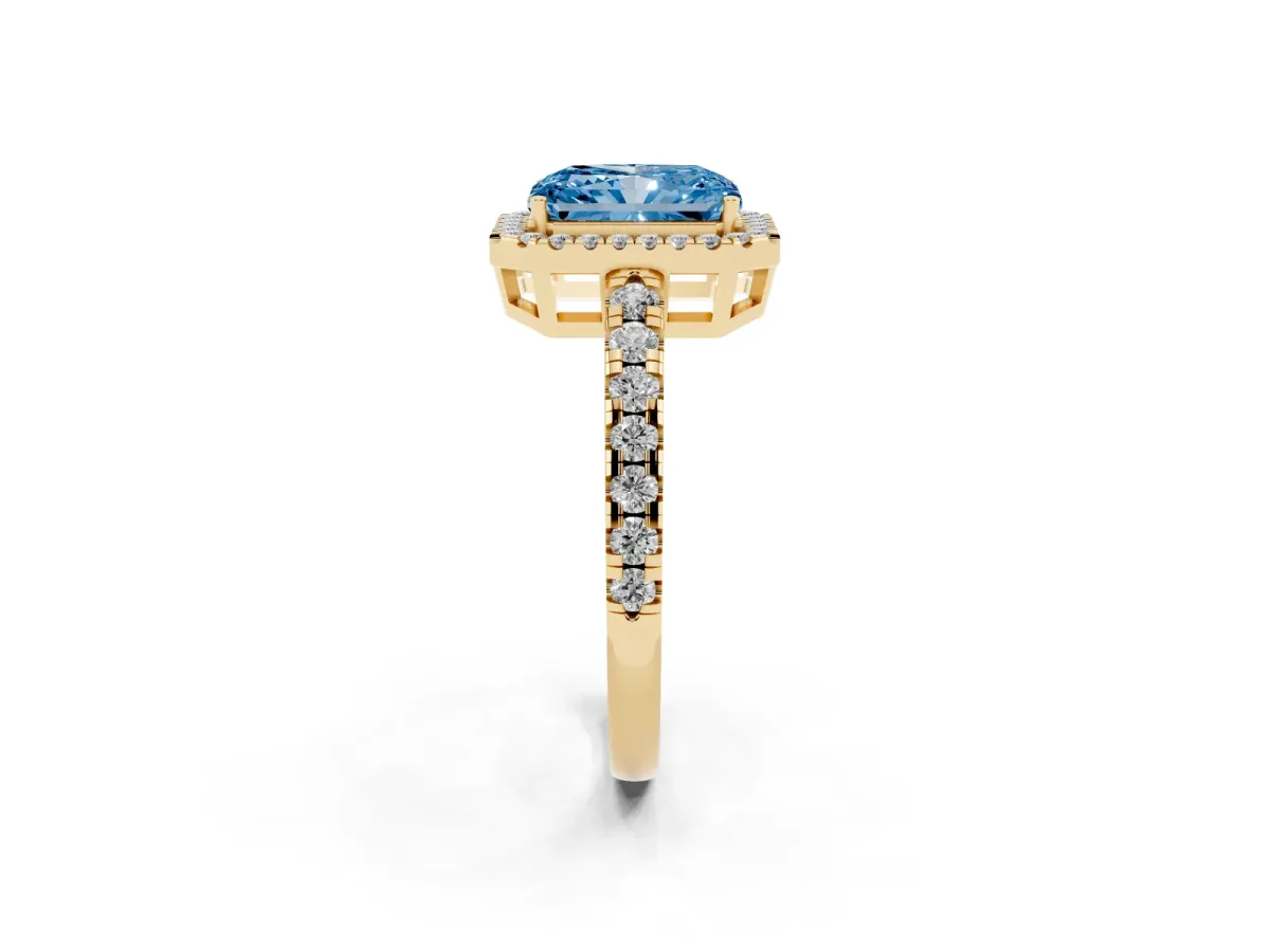 Fancy Blue Radiant Cut Diamond Halo Ring with Pavé Band and Four-Prong Setting Yellow gold