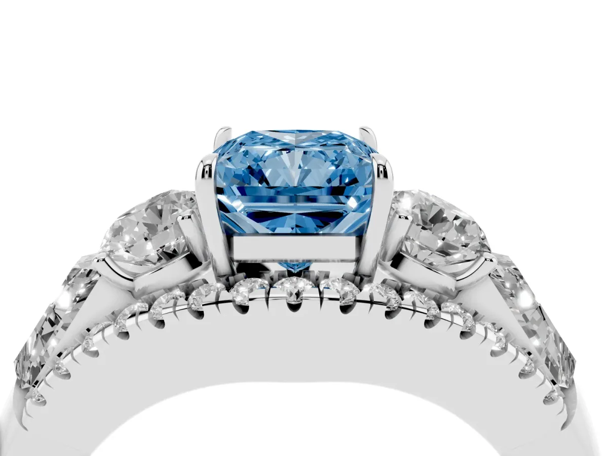 Fancy Blue Three-Stone Radiant Cut Diamond Engagement Ring with Pave Band and Prong Setting Silver