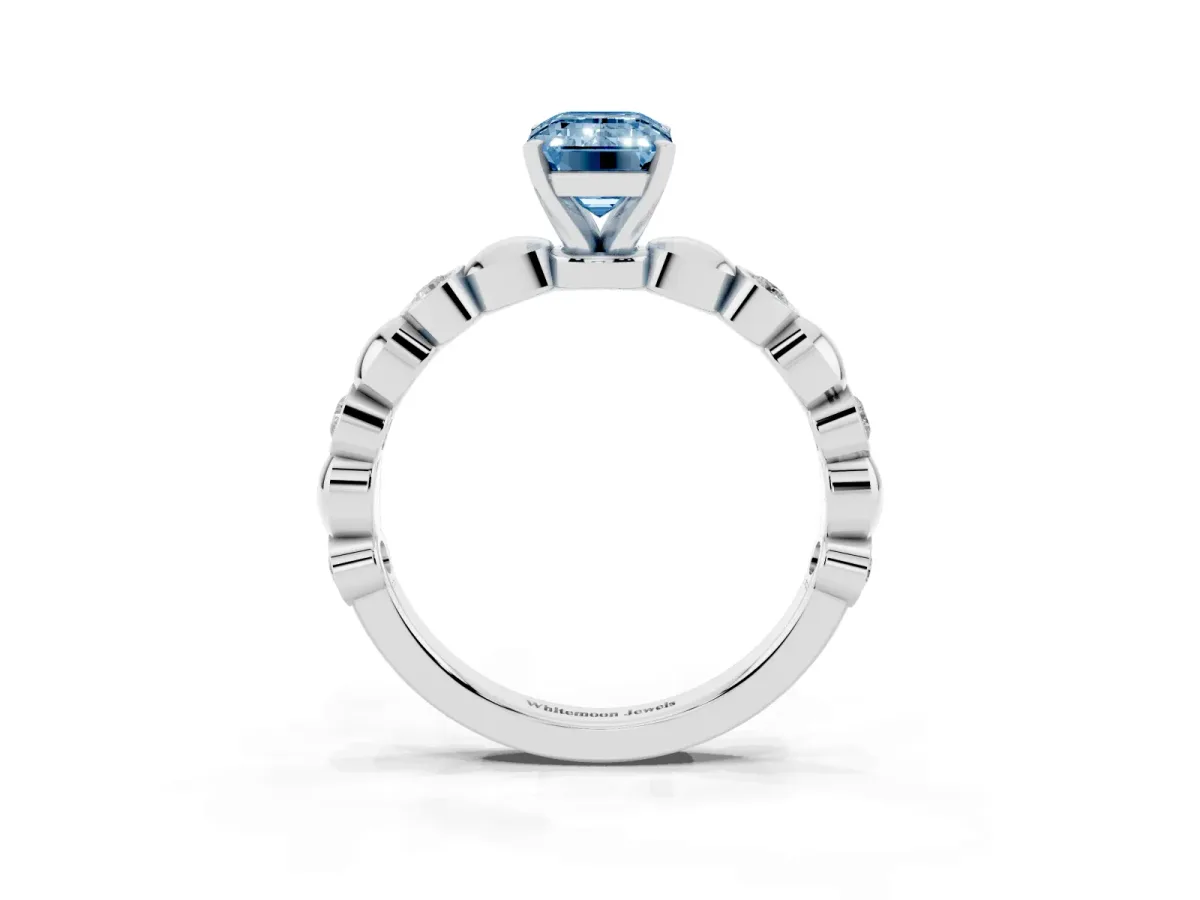 Fancy Blue Emerald Cut Solitaire Bezel-Set Diamond Ring with Beaded Band and Four-Prong Setting Silver