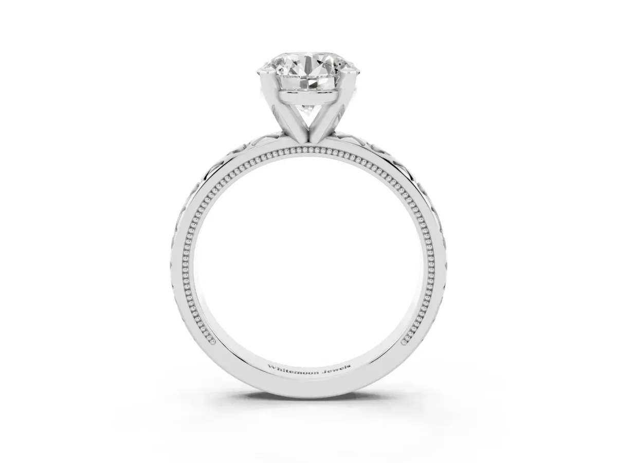 Round Cut Solitaire Diamond Engagement Ring with XO Engraved Band and Four-Prong Setting Silver