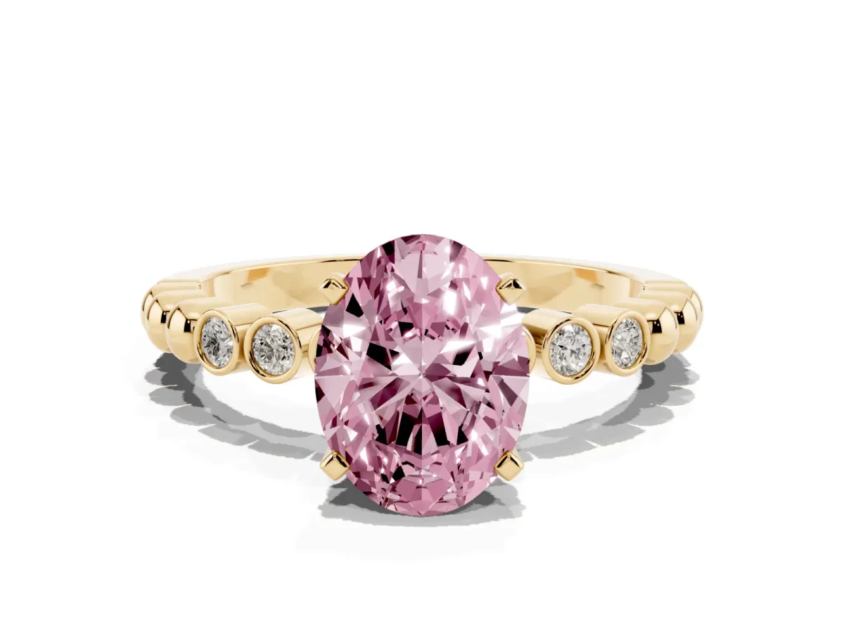 Fancy Pink Oval Cut Solitaire Bezel Accent Diamond Engagement Ring with Beaded Band and Four-Prong Setting Yellow gold