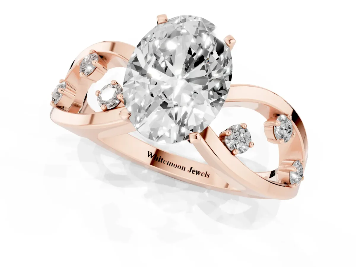 Oval Cut Cut Solitaire Diamond with Side Stones on Criss-Cross Band and Four-Prong Setting Rose gold