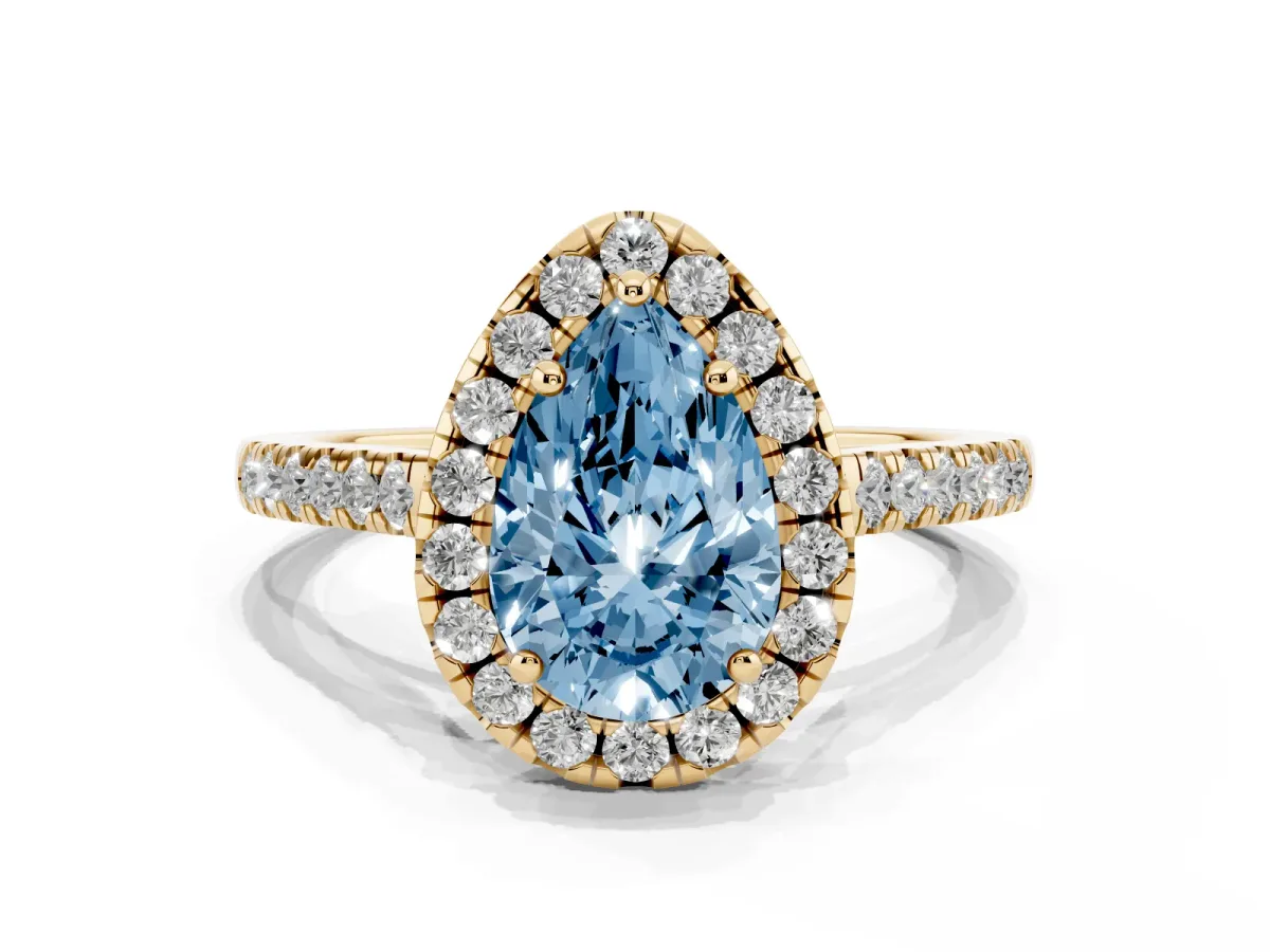 Fancy Blue Pear Cut Halo Pavé Diamond Engagement Ring with Four-Prong Setting Yellow gold