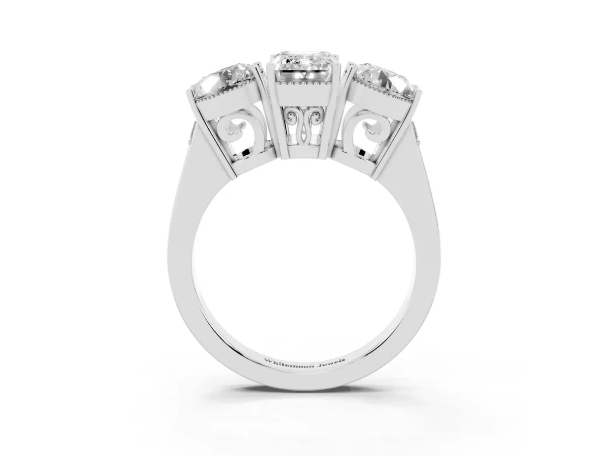 Three-Stone Emerald Cut Diamond Engagement Ring with Prong Setting on a Classic Band Platinum