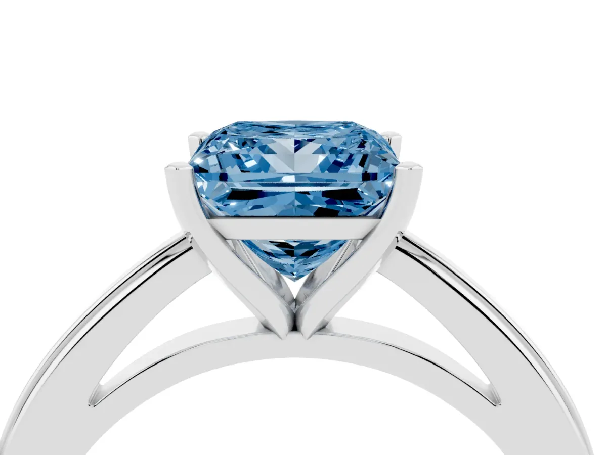 Fancy Blue Princess Cut Solitaire Diamond Ring with Four-Prong Setting and Classic Band Platinum