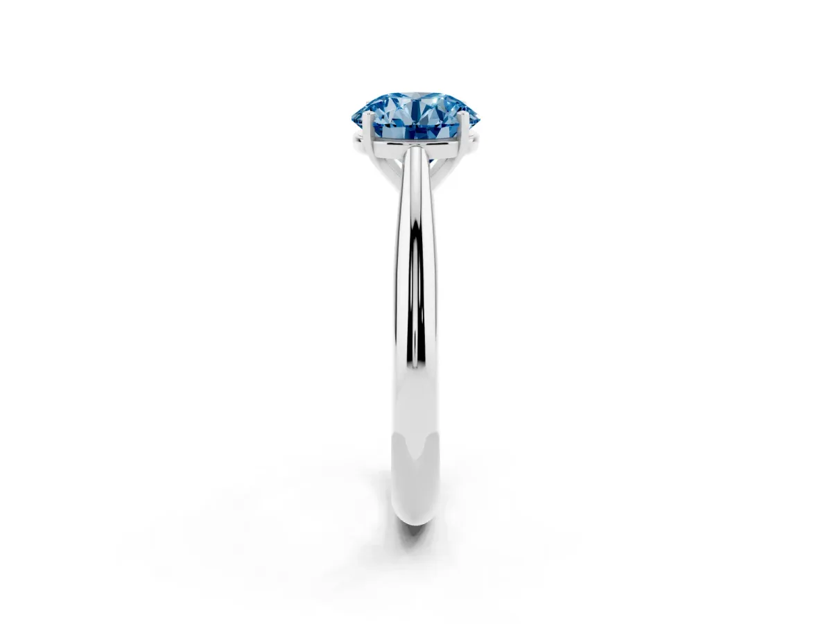 Fancy Blue Round Cut Diamond Solitaire Engagement Ring with Cathedral Setting and Four-Prong Mount Silver