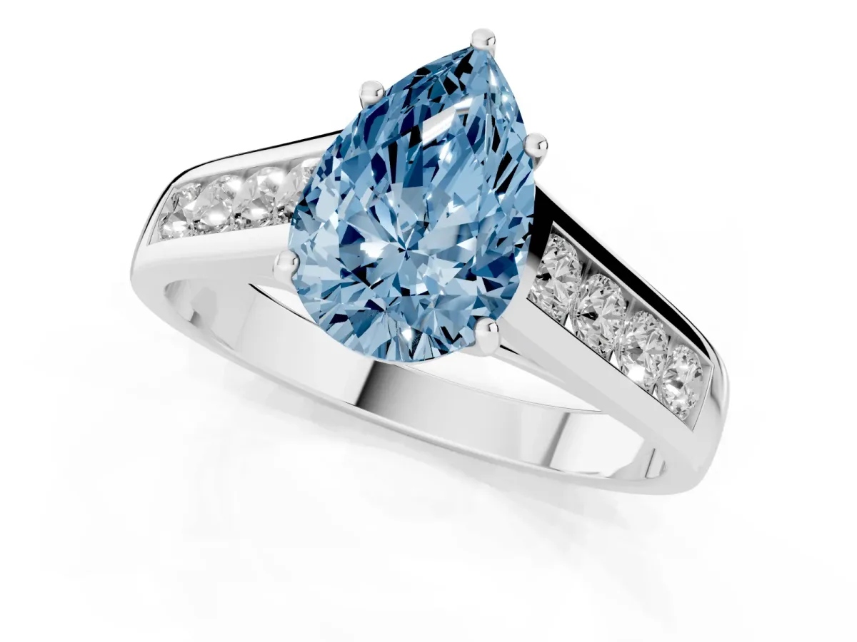 Fancy Blue Pear Cut Brilliant Channel-Set Solitaire Ring with Four-Prong Setting Silver
