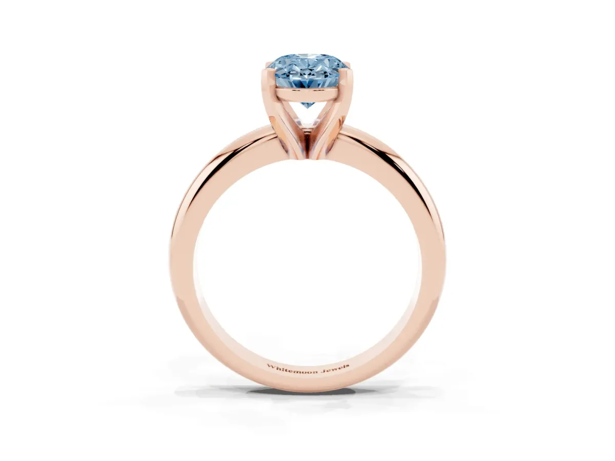 Fancy Blue Oval Cut Diamond Solitaire Engagement Ring with Round Band and Four-Prong Setting Rose gold