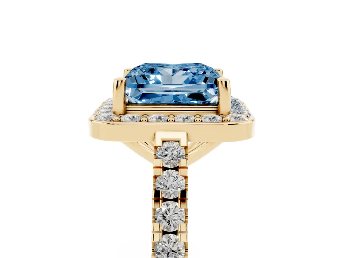 Fancy Blue Princess Cut Diamond Halo Ring with Round Pavé Split Shank and Prong Setting Yellow gold