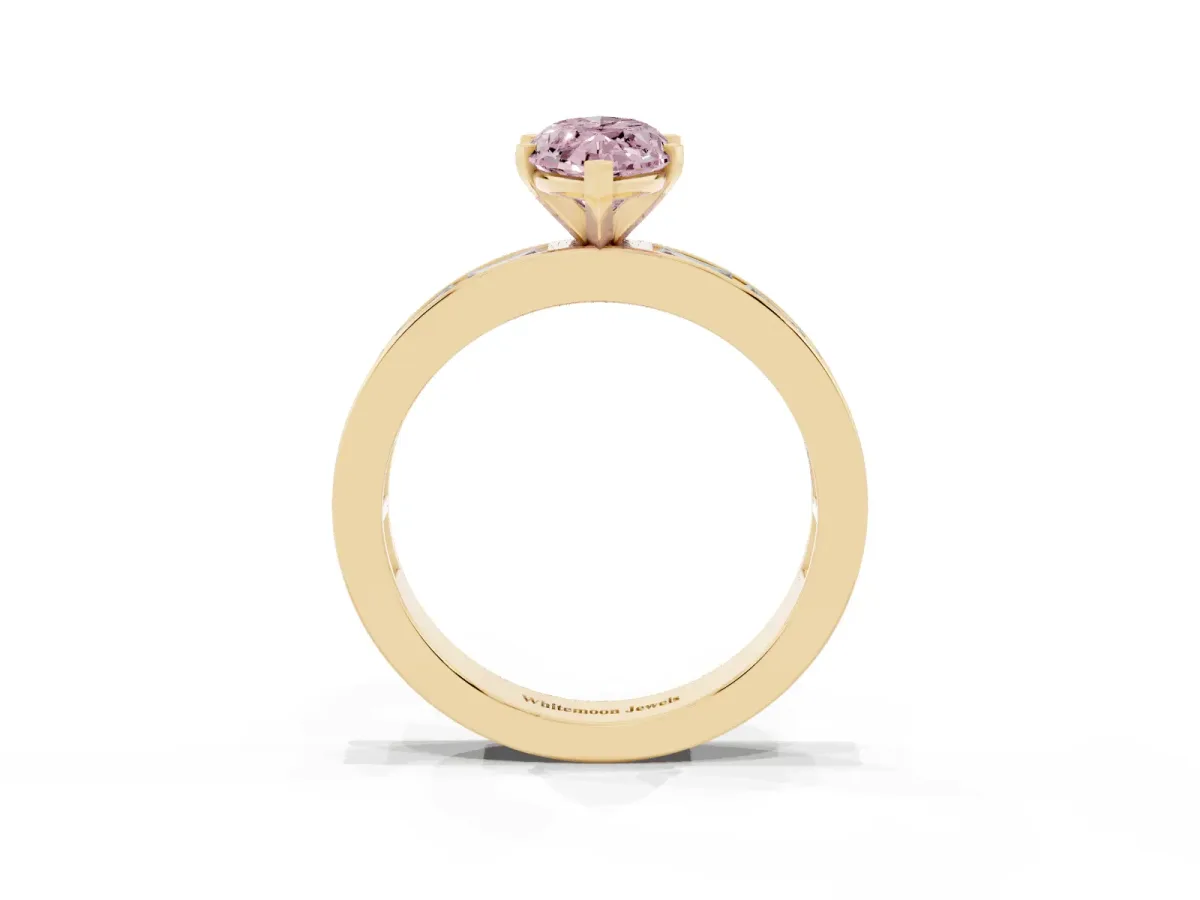 Fancy Pink Marquise Cut Solitaire Diamond Ring with Channel-Set Baguette Band and Four-Prong Setting Yellow gold