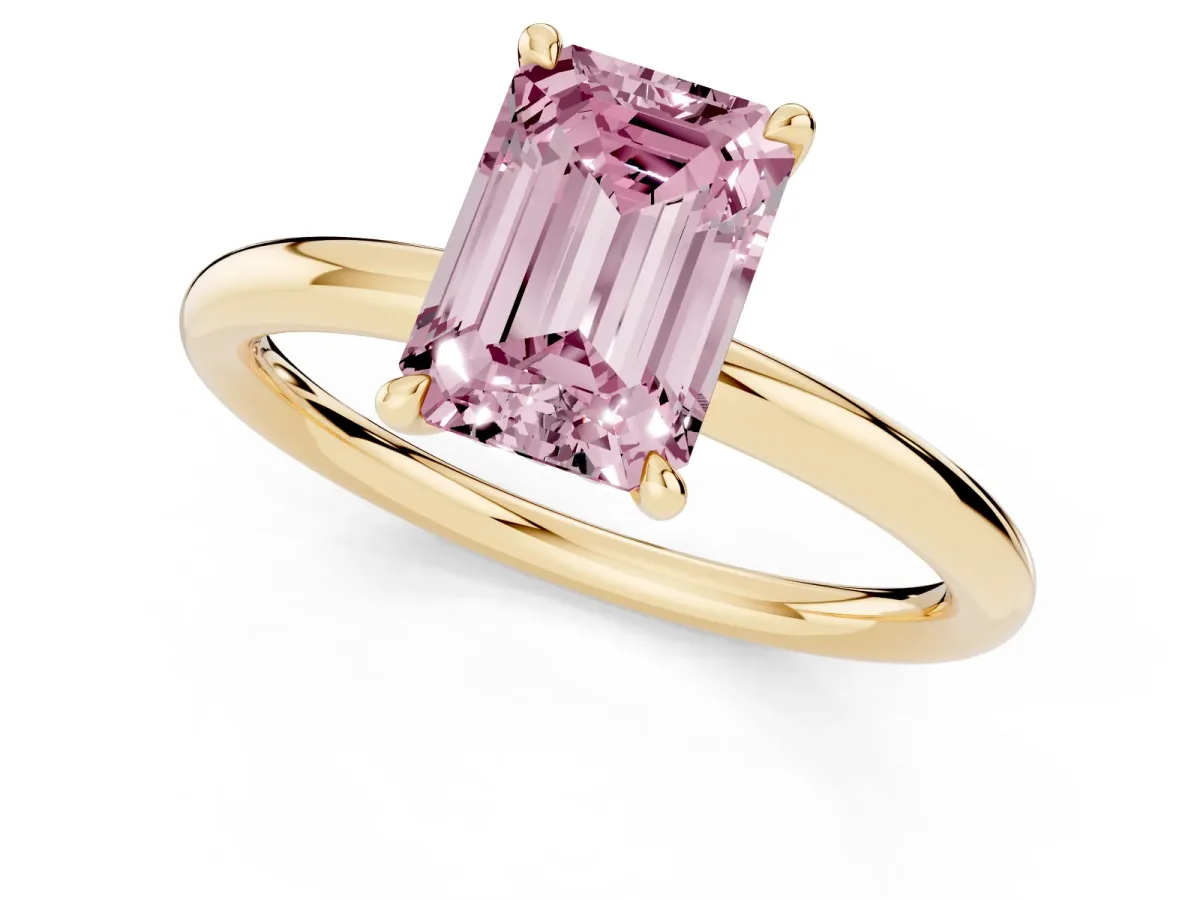 Fancy Pink Emerald Cut Diamond Solitaire Ring with Thin Band and Four-Prong Setting Yellow gold