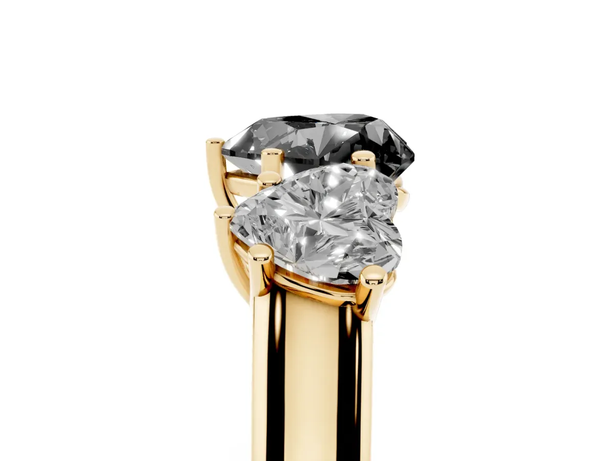 Fancy Black Heart Cut Three-Stone Diamond Ring with Prong Setting on a Classic Band Yellow gold