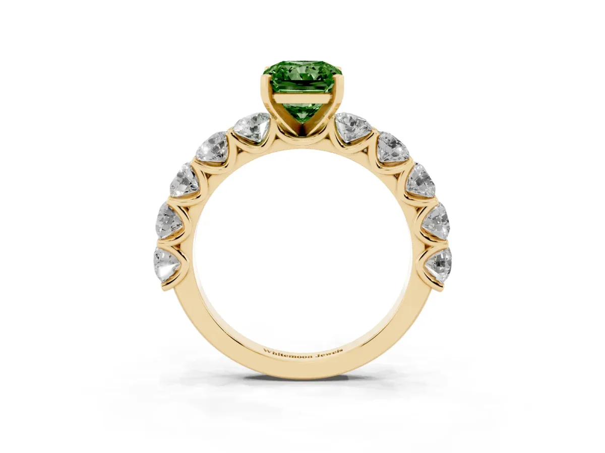 Fancy Green Radiant Cut Diamond Prong Setting with Side Stones on a Pave Band Yellow gold