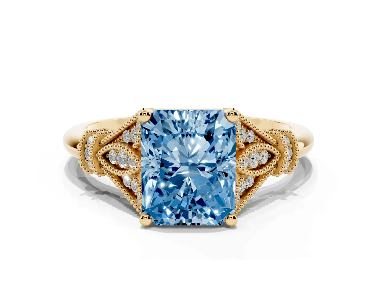 Fancy Blue Radiant Cut Diamond Solitaire Ring with Floral Filigree and Pave Accents Yellow gold