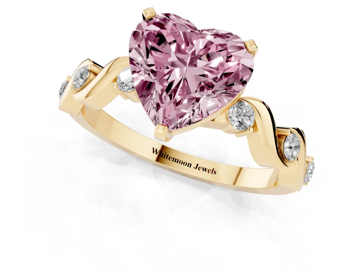 Fancy Pink Heart Cut Diamond Solitaire Twisted Band with Round Accents and Prong Setting Yellow gold