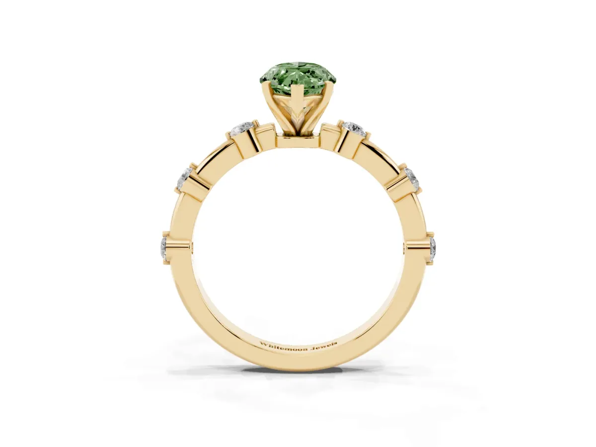 Fancy Green Marquise Cut Solitaire Diamond Ring with Bezel Set Side Stones and Prong Setting Yellow gold