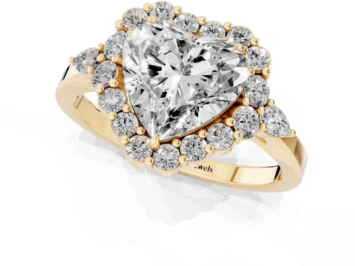 Heart Cut Diamond Halo Ring with Pear Side Stones and Prong Setting Yellow gold