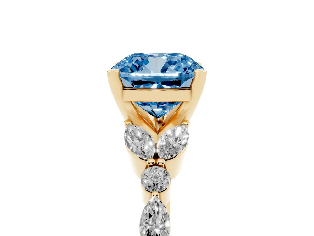 Fancy Blue Cushion Cut Diamond Solitaire Ring with Side Stones and Four-Prong Setting Yellow gold