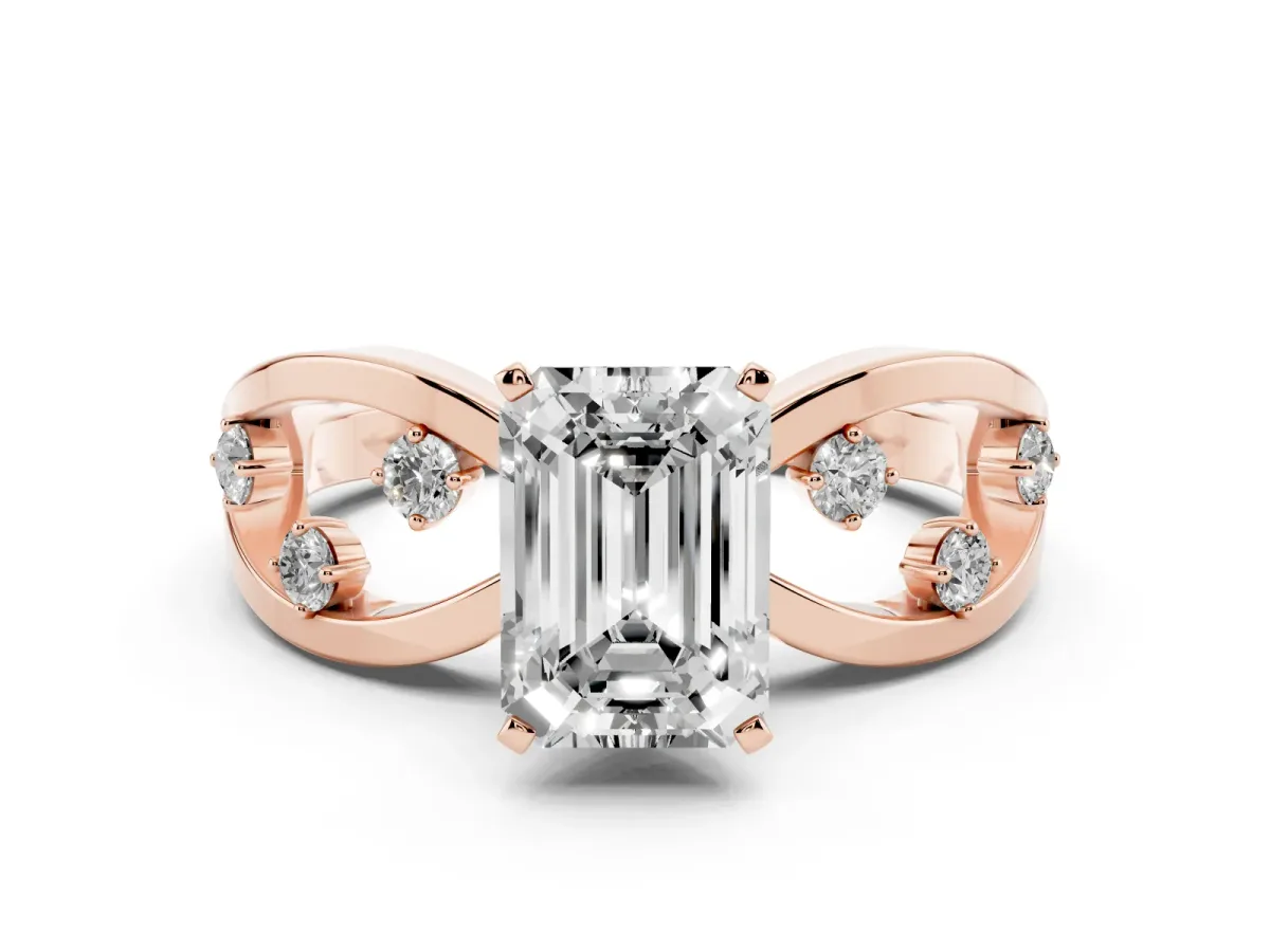 Emerald Cut Cut Solitaire Diamond with Side Stones on Criss-Cross Band and Four-Prong Setting Rose gold