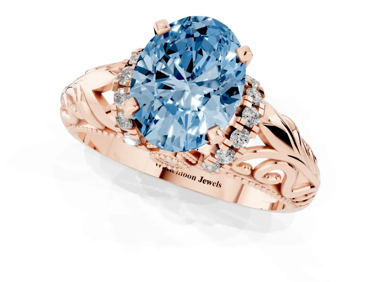 Fancy Blue Oval Cut Solitaire Filigree Engagement Ring with Halo and Prong Setting Rose gold