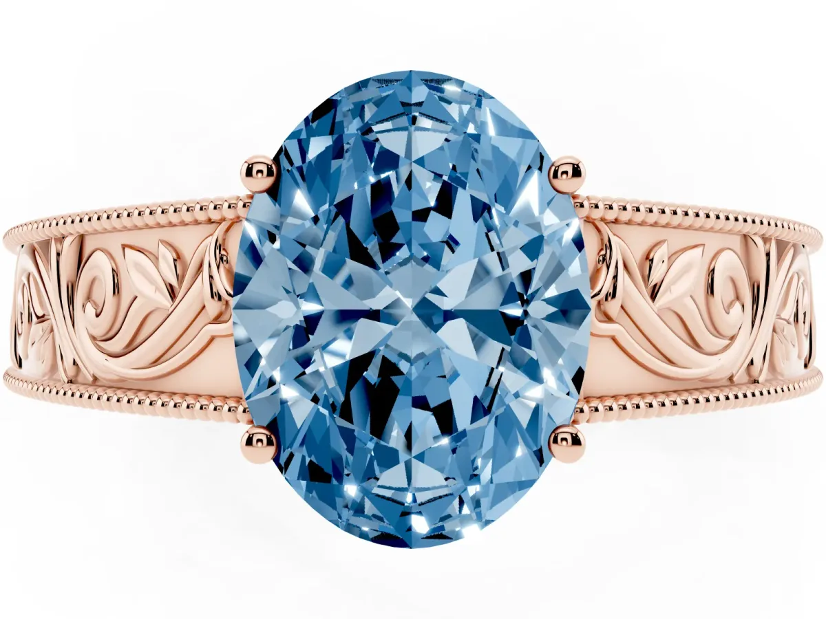 Fancy Blue Oval Cut Diamond Solitaire Ring with Engraved Band and Four-Prong Setting Rose gold