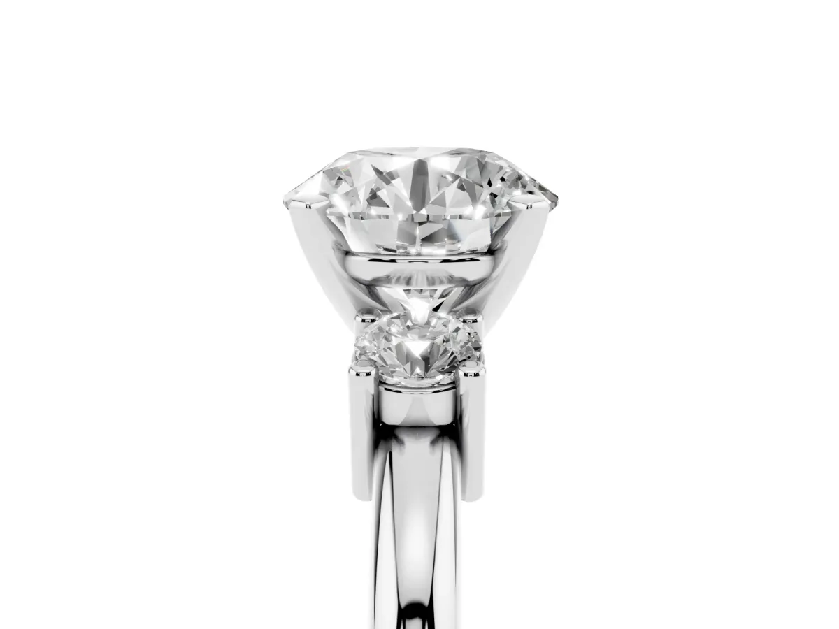 Three-Stone Round Cut Cut Diamond Solitaire with Prong Setting and Classic Band Silver