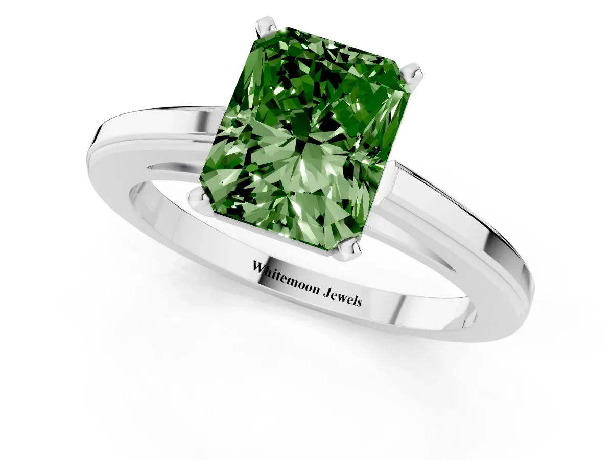 Fancy Green Radiant Cut Solitaire Diamond Ring with Four-Prong Setting and Classic Band Silver