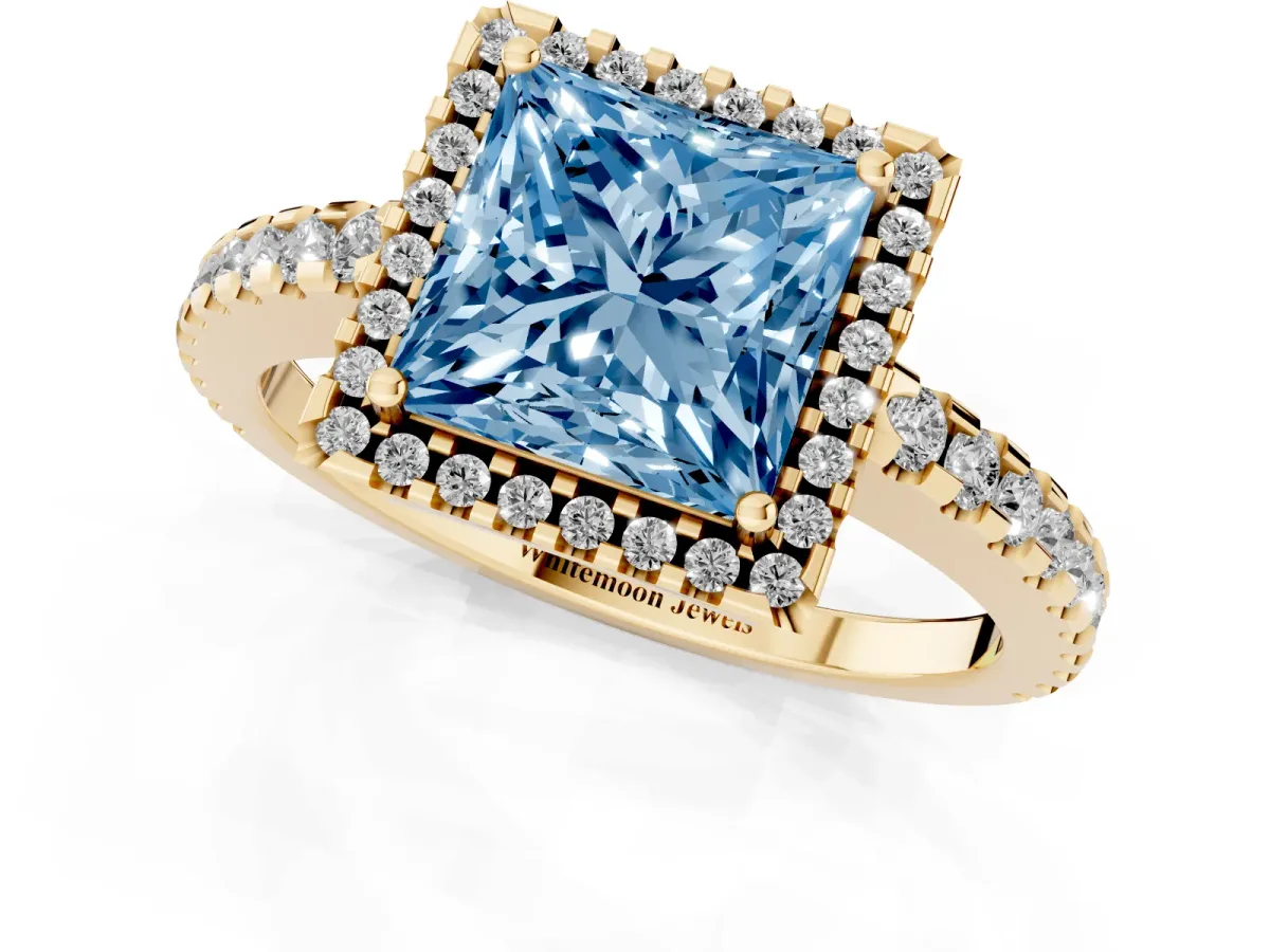 Fancy Blue Princess Cut Diamond Halo Engagement Ring with Pavé Band and Prong Setting Yellow gold