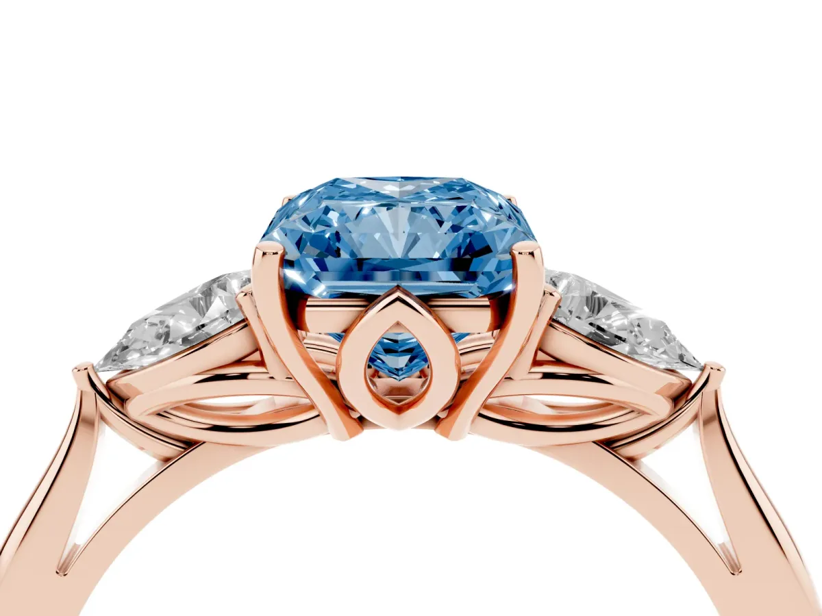 Fancy Blue Radiant Cut Diamond Three-Stone Ring with Pear Side Stones and Prong Setting Rose gold