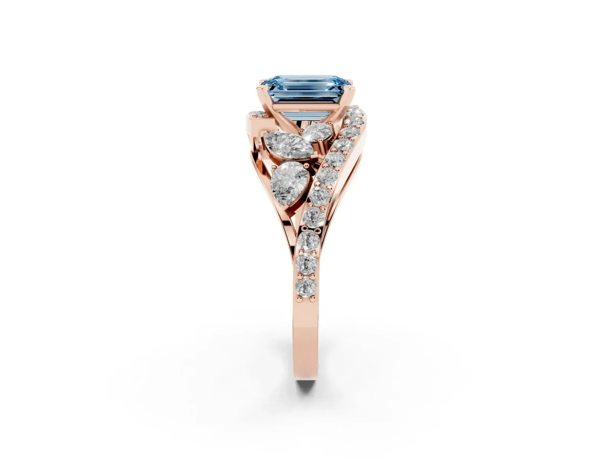 Fancy Blue Emerald Cut Diamond Halo Ring with Marquise and Pavé Band in Prong Setting Rose gold