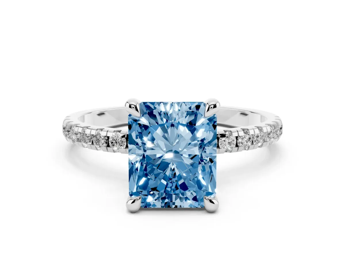 Fancy Blue Radiant Cut Diamond Brilliant Solitaire Ring with Pavé Band and Four-Prong Setting Silver