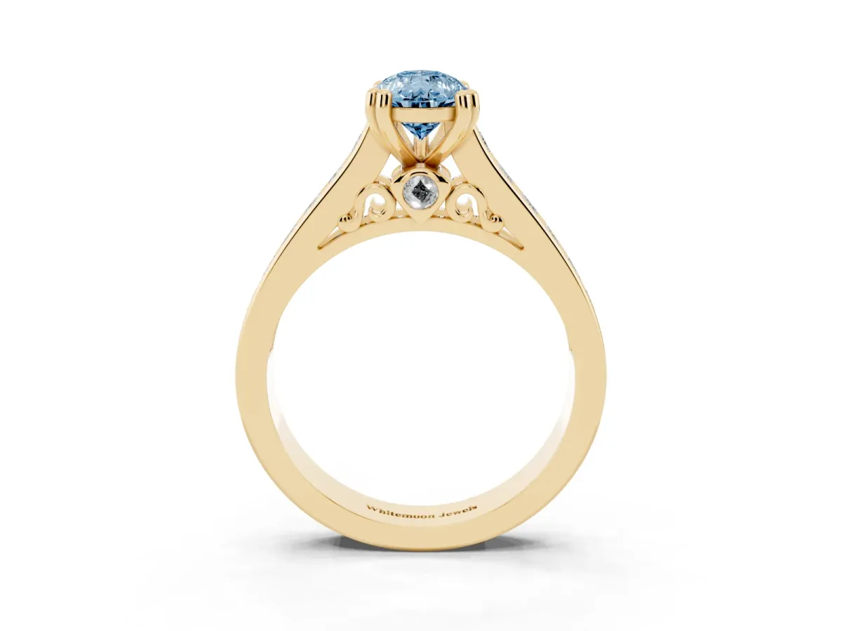 Fancy Blue Pear Cut Cut Channel Set Solitaire Engagement Ring with Prong Setting Yellow gold