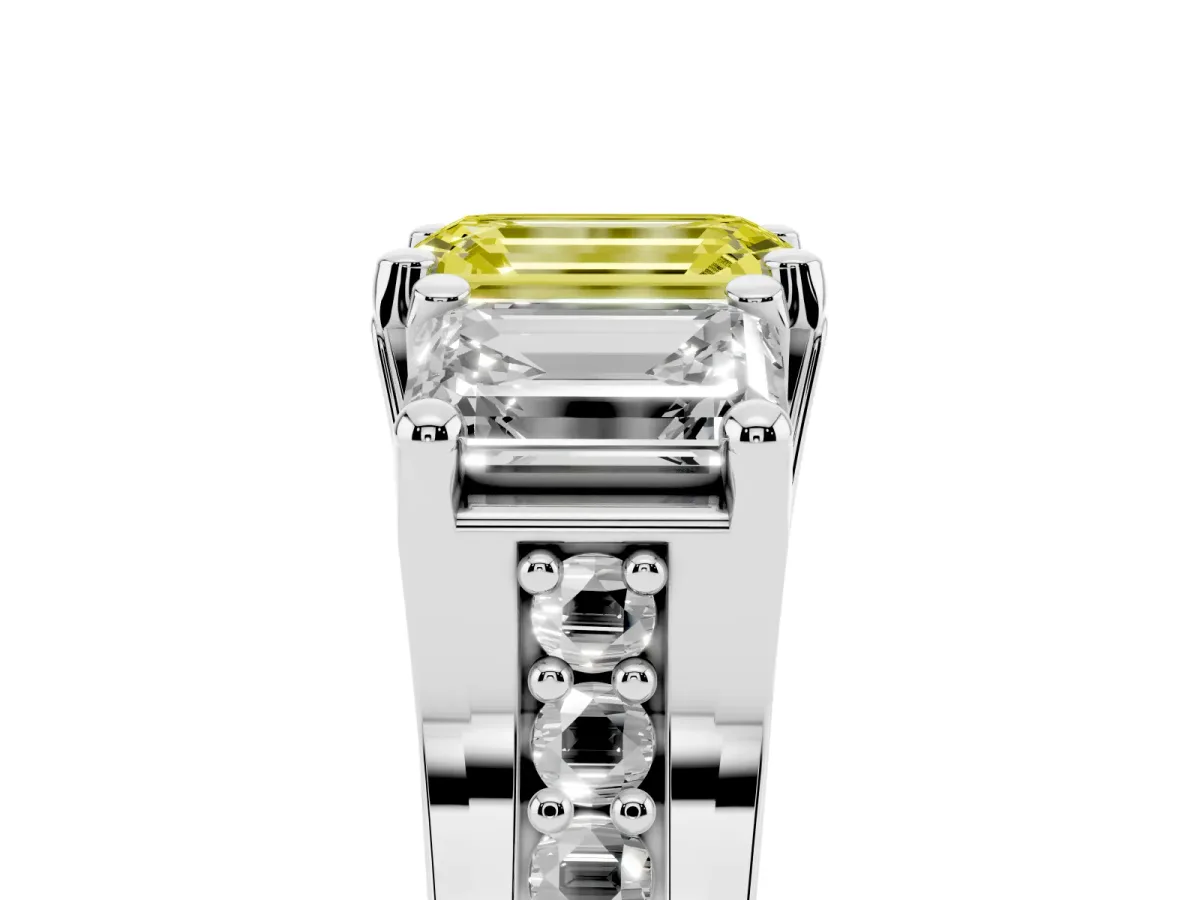Fancy Yellow Emerald Cut Diamond Three-Stone Ring with Channel Set Band and Four-Prong Setting Platinum