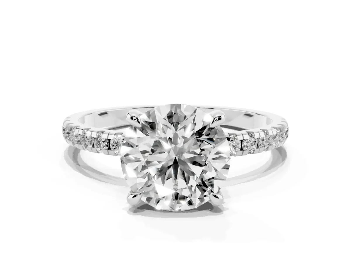 Round Cut Diamond Brilliant Solitaire Ring with Pavé Band and Four-Prong Setting Silver