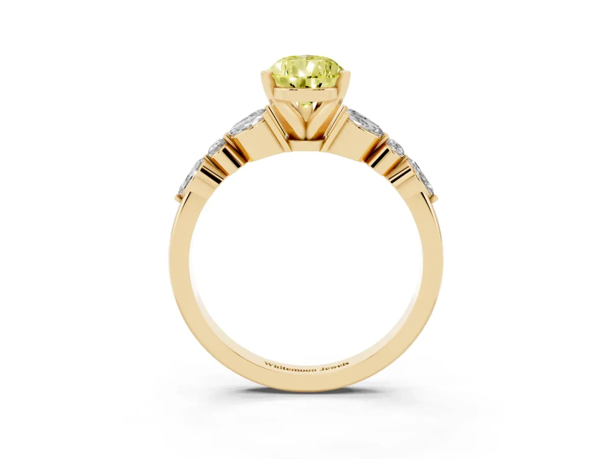 Fancy Yellow Pear Cut Diamond Solitaire Ring with Side Stones and Four-Prong Setting Yellow gold
