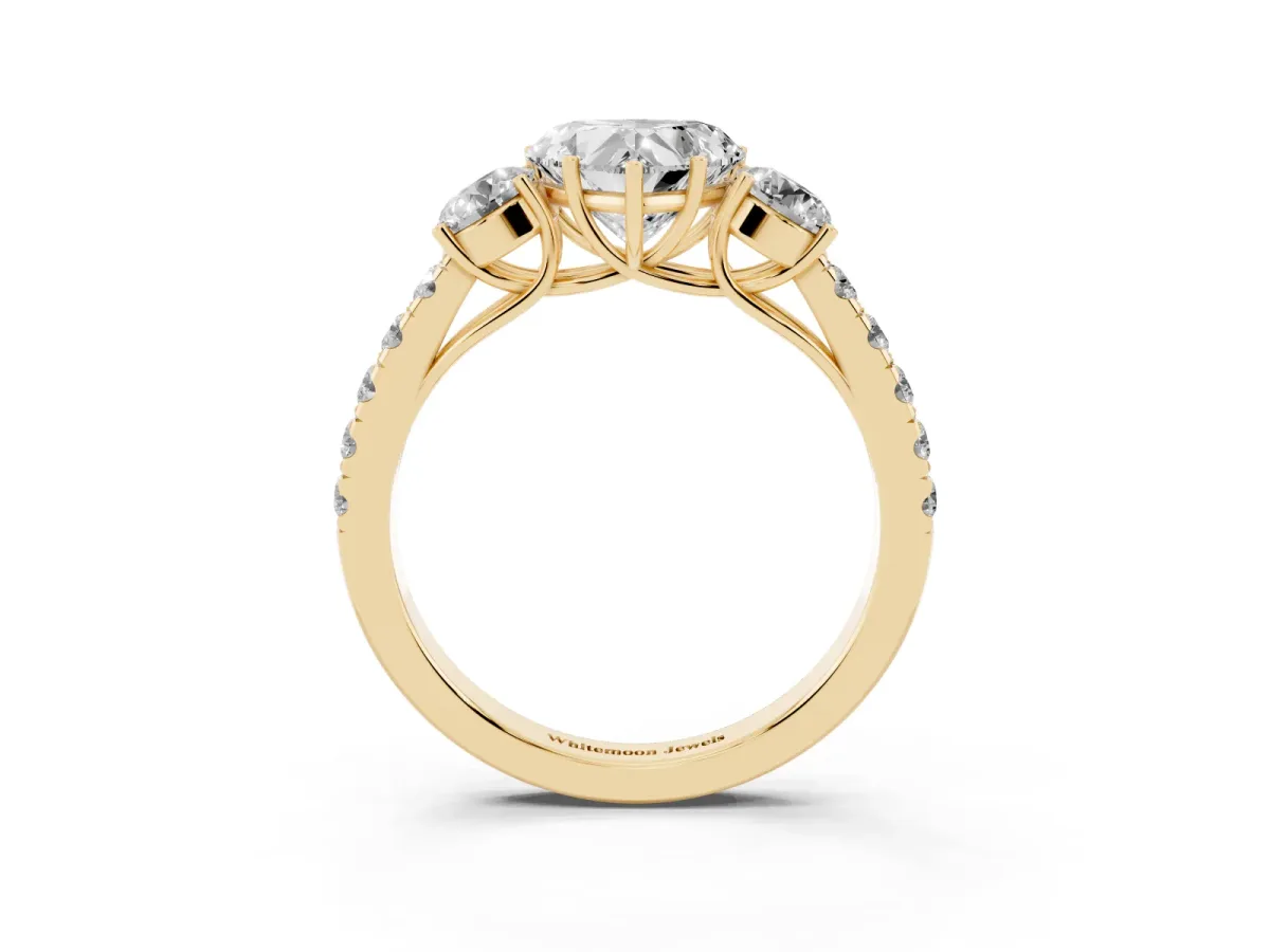 Heart Cut Cut Diamond Three-Stone Ring with Round Side Stones and Pavé Band Yellow gold
