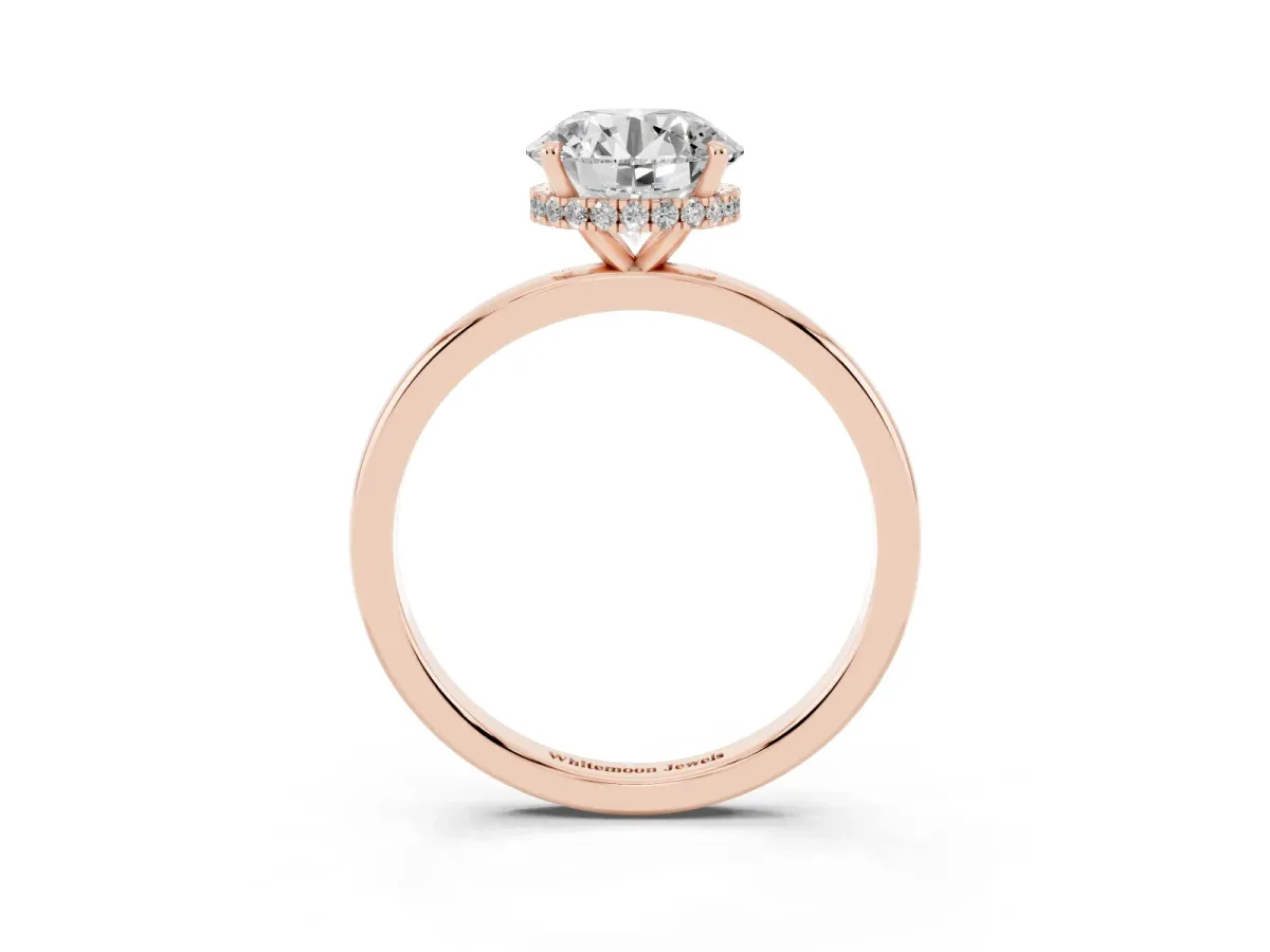 Round Cut Solitaire Engagement Ring with Cathedral Band and Four-Prong Setting Rose gold